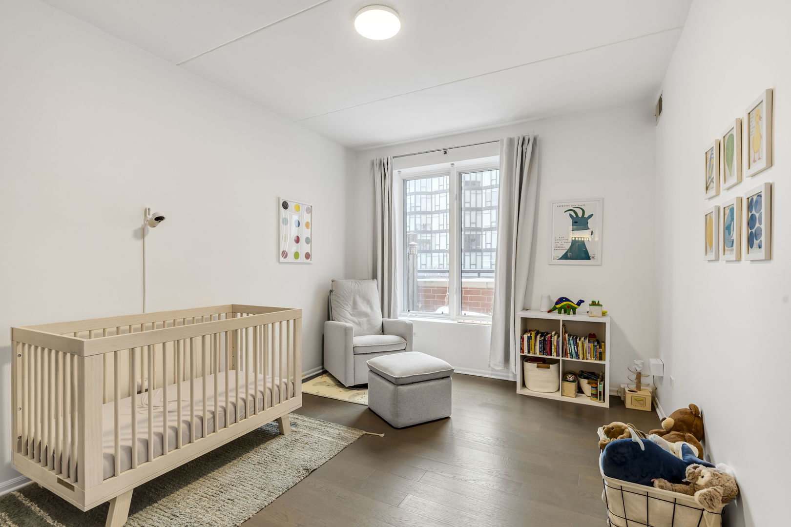 515 Main Street, Unit 308 Evanston, IL 60202 - Photo 14 of 19 a living room with furniture and a window