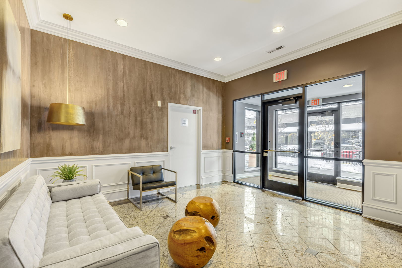 515 Main Street, Unit 308 Evanston, IL 60202 - Photo 17 of 19 a living room with furniture and floor to ceiling window