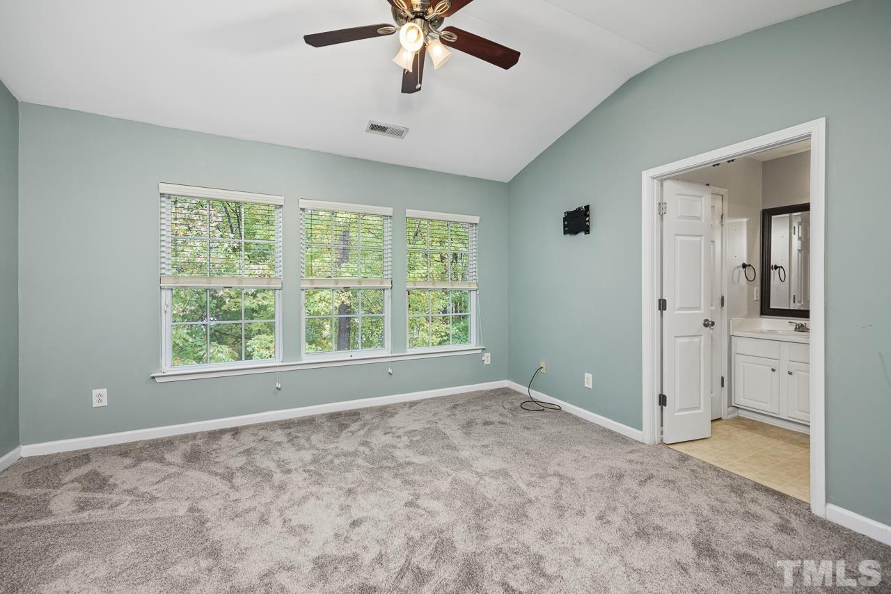 4422 Vienna Crest Drive Raleigh, NC 27613 - Photo 13 of 28 a view of an empty room with a window