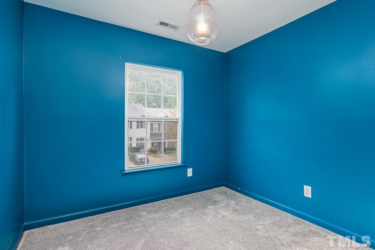 4422 Vienna Crest Drive Raleigh, NC 27613 - Photo 18 of 28 an empty room with windows