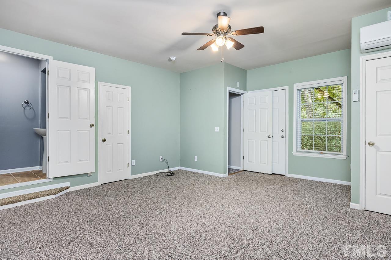 4422 Vienna Crest Drive Raleigh, NC 27613 - Photo 22 of 28 a view of an empty room with a window