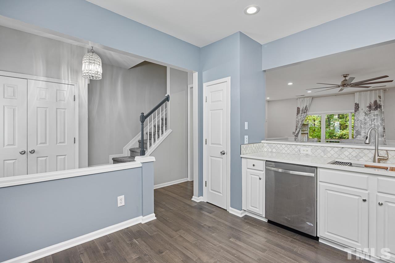 4422 Vienna Crest Drive Raleigh, NC 27613 - Photo 3 of 28 a view of a kitchen cabinets and wooden floor