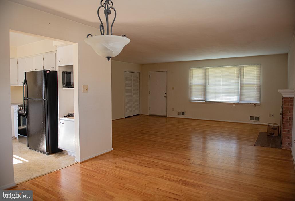 5232 Oldcastle Lane Springfield, VA 22151 - Photo 7 of 23 DINING ROOM & LIVING ROOM AT OTHER ANGLE
