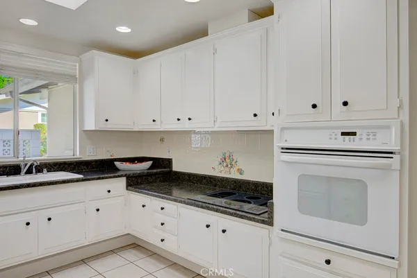 a view of bathroom with a washer and dryer