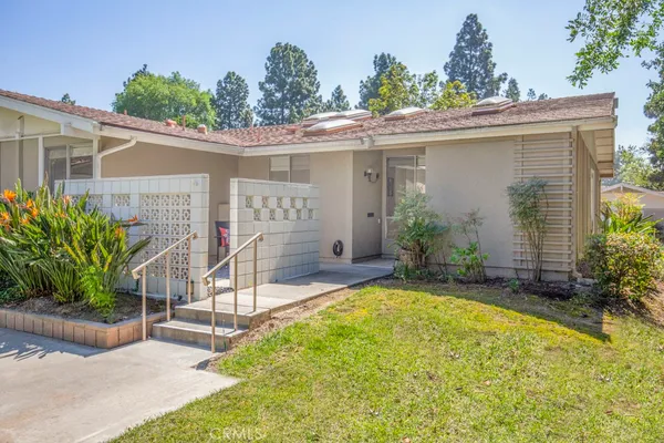front view of a house with a patio