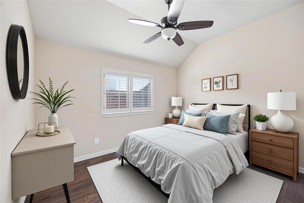 676 Scenic Ranch Circle Fairview, TX 75069 - Photo 21 of 30 a bedroom with a large bed and a chandelier