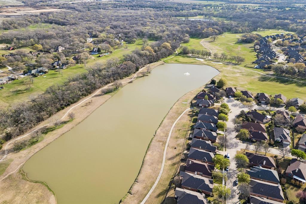 676 Scenic Ranch Circle Fairview, TX 75069 - Photo 23 of 30 a view of swimming pool with a yard and lake view