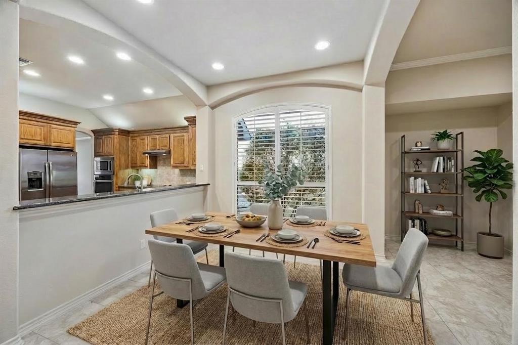 676 Scenic Ranch Circle Fairview, TX 75069 - Photo 6 of 30 a dining room with furniture and window