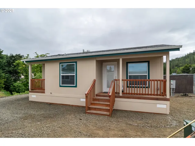 a house view with a backyard