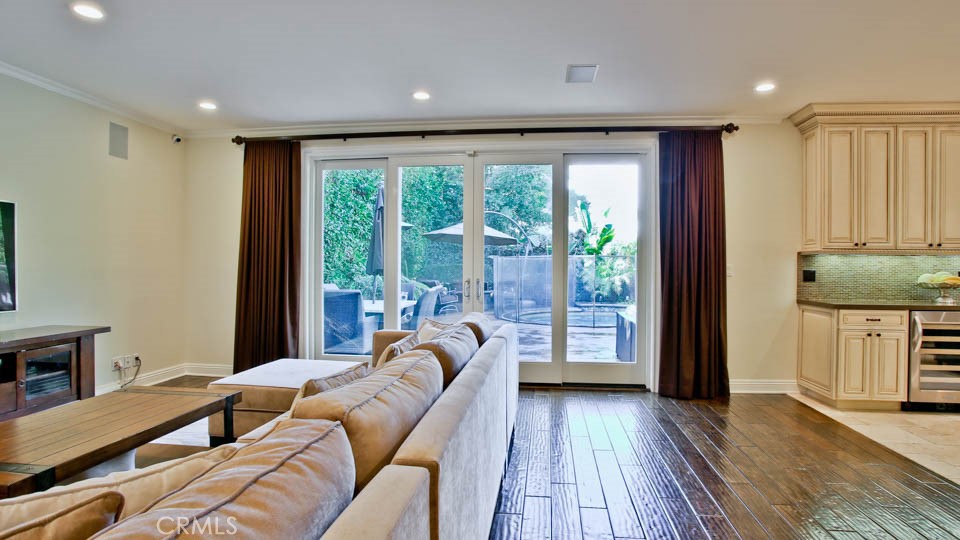 4461 Stern Avenue Sherman Oaks, CA 91423 - Photo 22 of 62 a living room with furniture and a large window