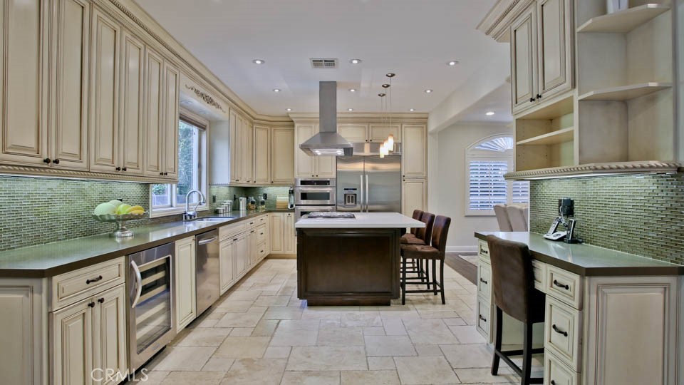 4461 Stern Avenue Sherman Oaks, CA 91423 - Photo 23 of 62 a large kitchen with granite countertop a sink and cabinets