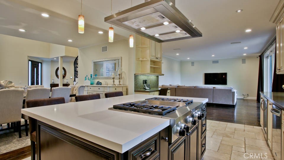 4461 Stern Avenue Sherman Oaks, CA 91423 - Photo 27 of 62 a large kitchen with a table and chairs