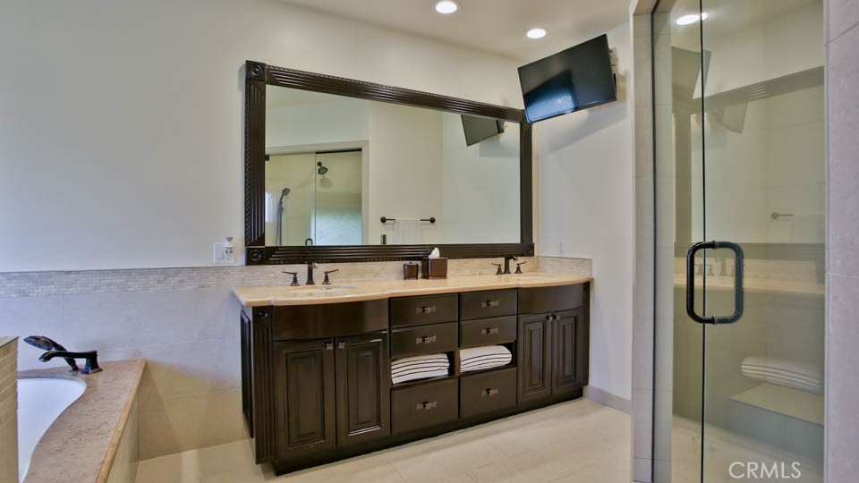 4461 Stern Avenue Sherman Oaks, CA 91423 - Photo 44 of 62 a bathroom with a double vanity sink mirror and double