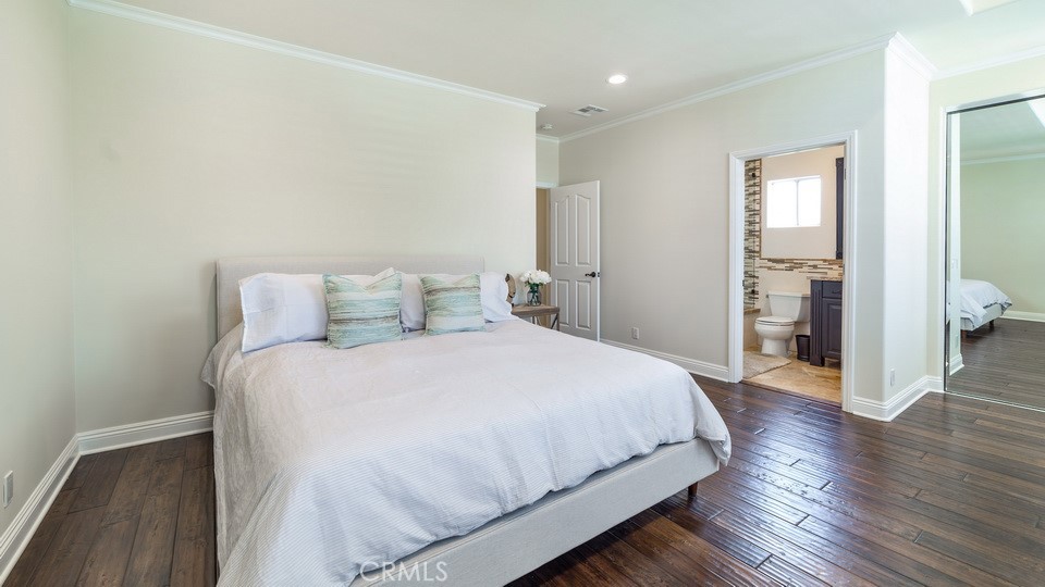 4461 Stern Avenue Sherman Oaks, CA 91423 - Photo 47 of 62 a bedroom with a bed and a view of kitchen