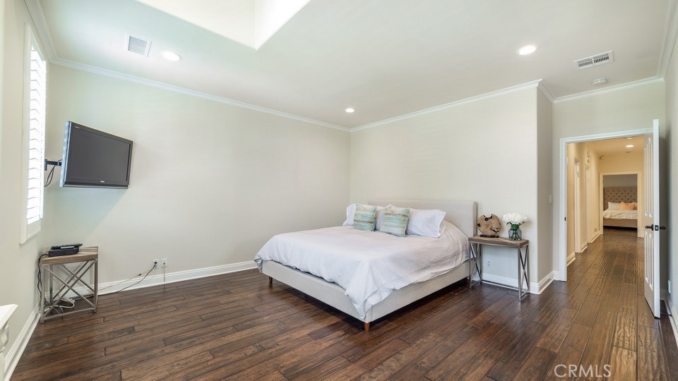 4461 Stern Avenue Sherman Oaks, CA 91423 - Photo 48 of 62 a bedroom with a bed and a flat screen tv
