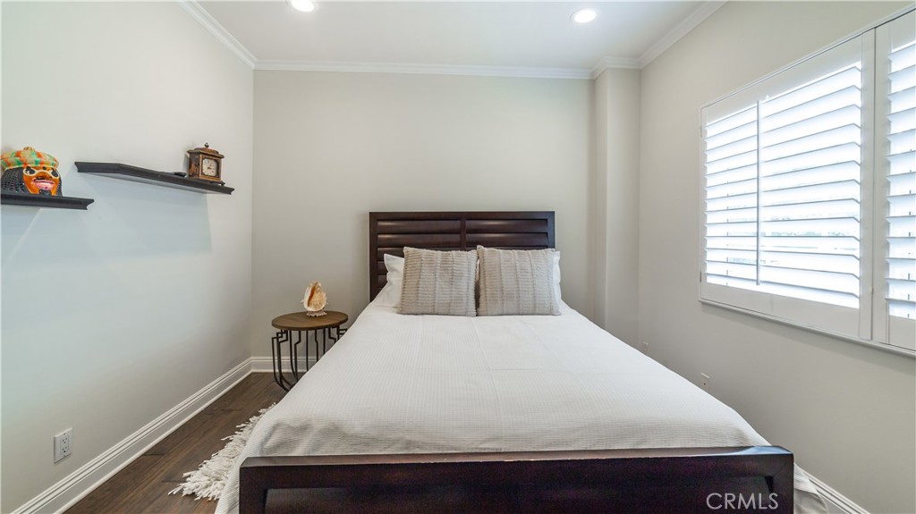 4461 Stern Avenue Sherman Oaks, CA 91423 - Photo 58 of 62 a bedroom with a bed and window