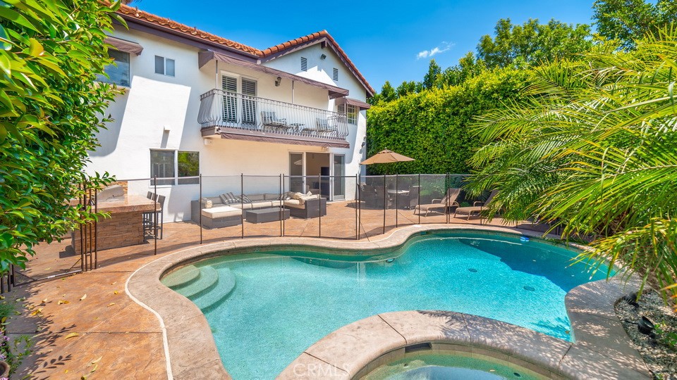 4461 Stern Avenue Sherman Oaks, CA 91423 - Photo 6 of 62 a view of a house with a yard patio and swimming pool