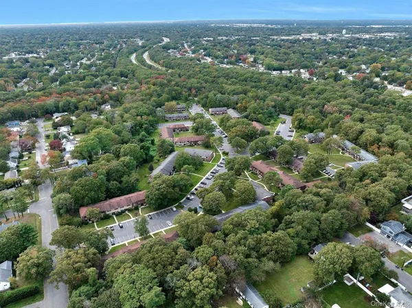 an aerial view of a city with lots of residential buildings