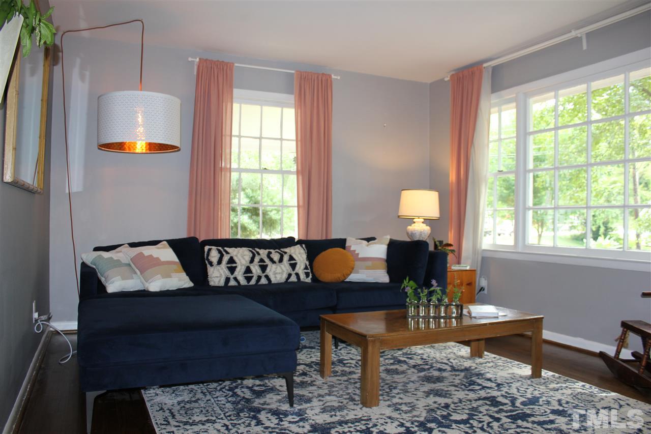 904 Chatham Lane Raleigh, NC 27610 - Photo 2 of 29 a living room with furniture and a table
