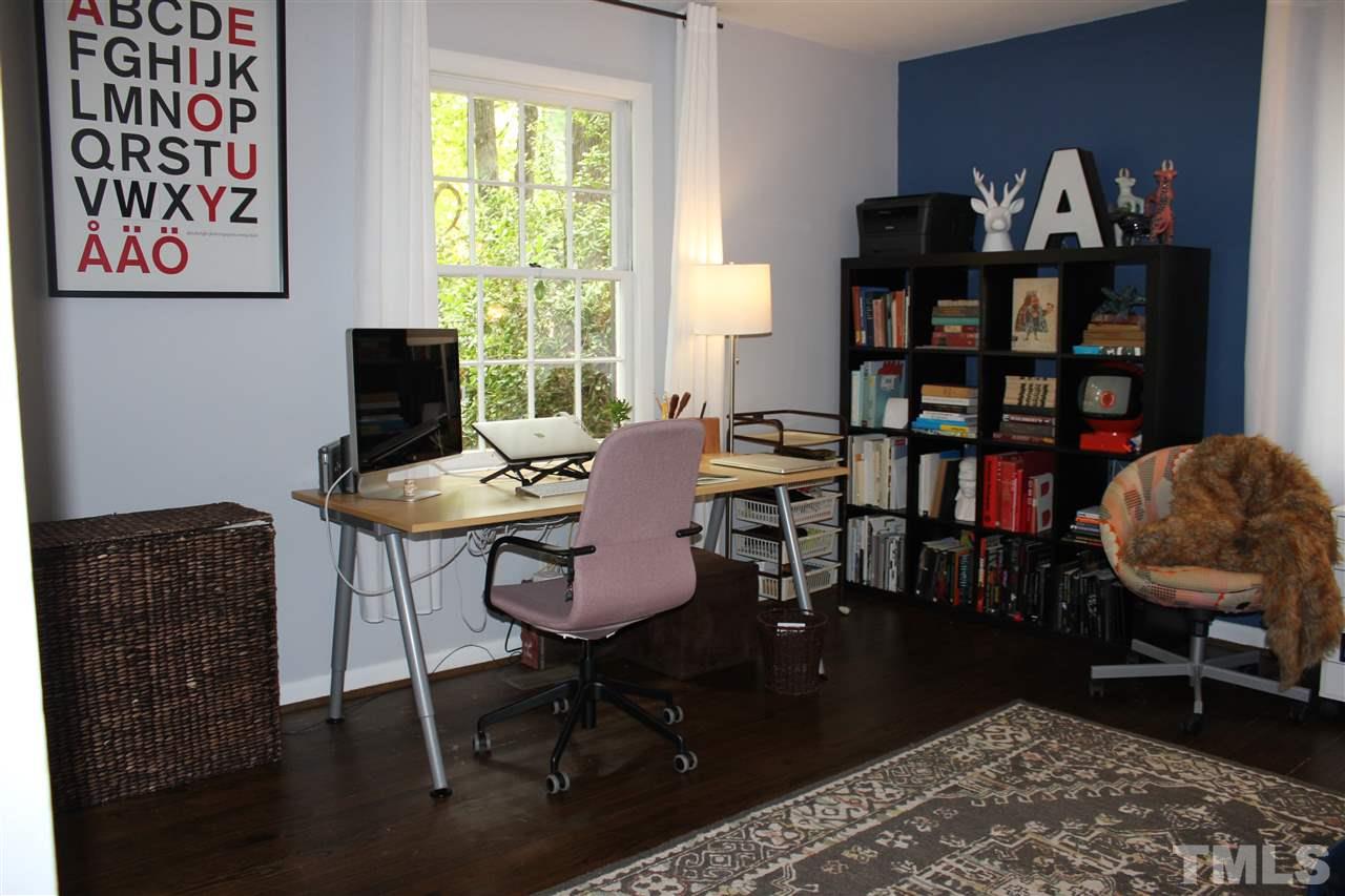 904 Chatham Lane Raleigh, NC 27610 - Photo 12 of 29 a view of a workspace with furniture and a window