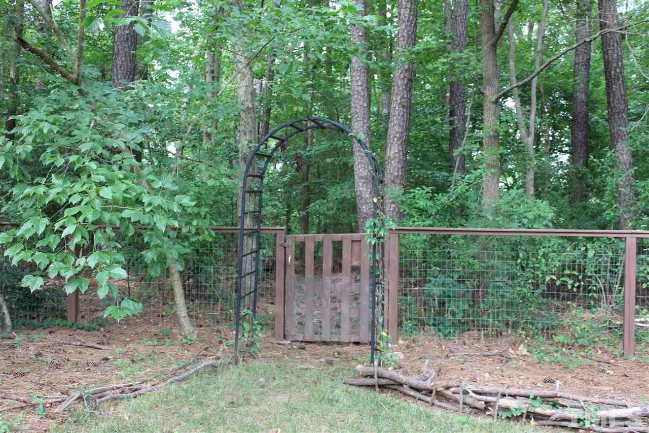 904 Chatham Lane Raleigh, NC 27610 - Photo 26 of 29 a view of a fence in a yard