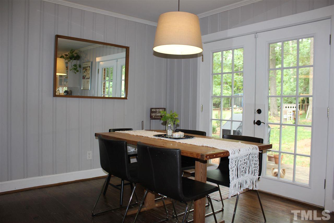 904 Chatham Lane Raleigh, NC 27610 - Photo 4 of 29 a view of a dining room with furniture window and outside view
