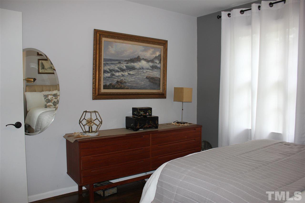 904 Chatham Lane Raleigh, NC 27610 - Photo 9 of 29 a bedroom with a bed and furniture