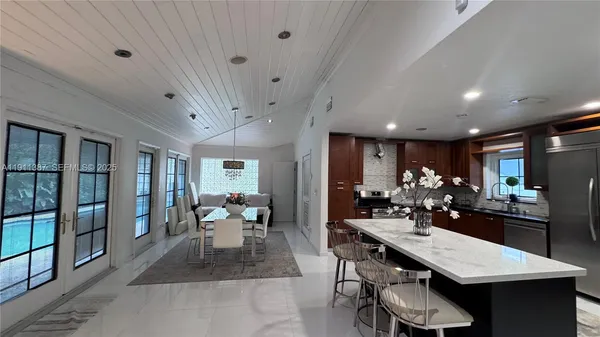 a view of a dining room with furniture