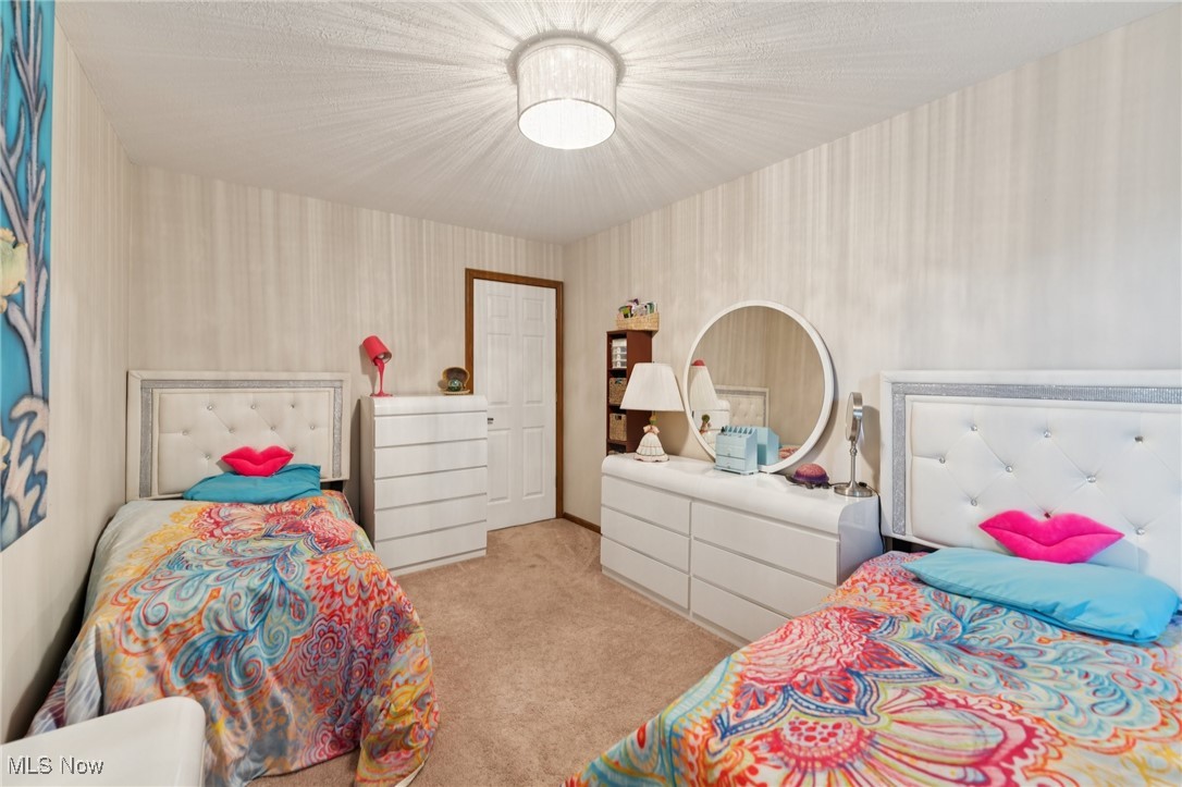 6930 Firestone Road Northeast Canton, OH 44721 - Photo 35 of 49 Bedroom featuring light carpet