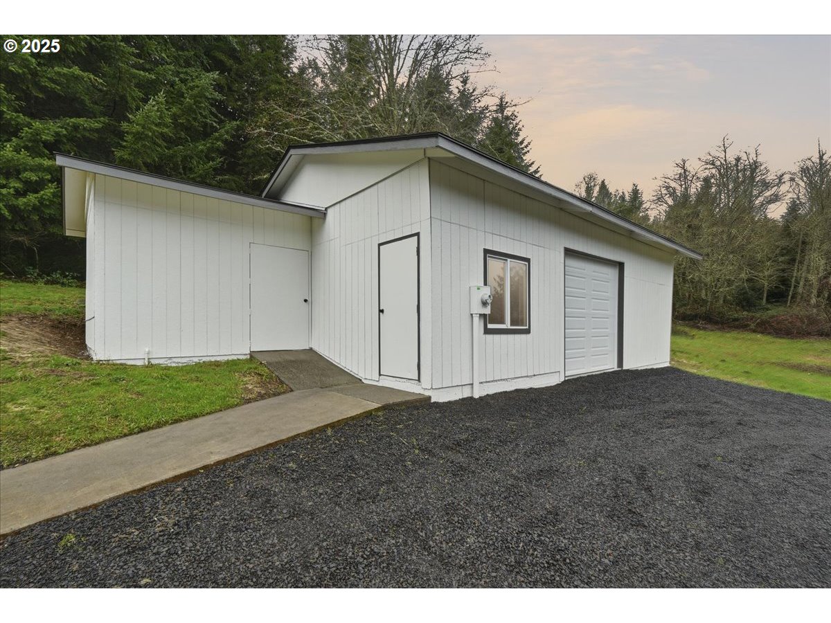 73345 Apiary Road Rainier, OR 97048 - Photo 32 of 44 a view of a house with a outdoor space