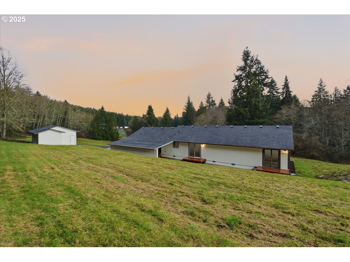 73345 Apiary Road Rainier, OR 97048 - Photo 41 of 44 a house view with a garden space