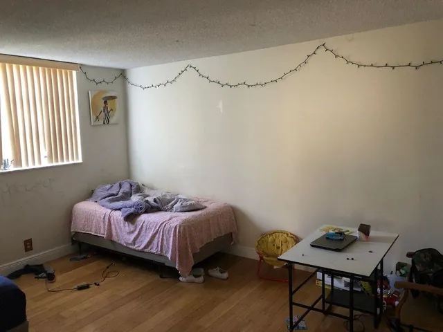 a room with a walk in closet and bathroom