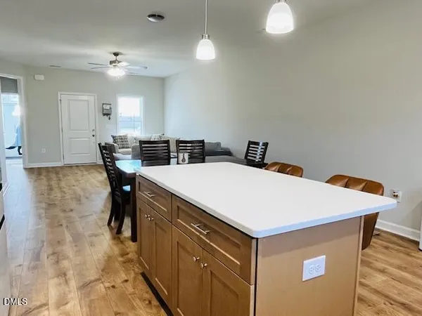 a kitchen with a cabinets appliances and a counter space