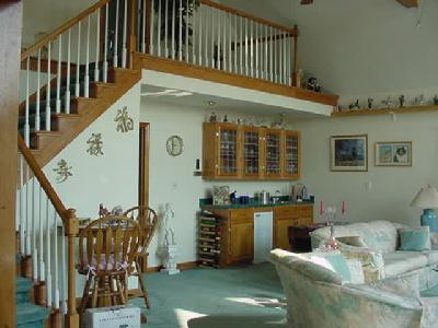 Family room with wet bar, door into Mast
