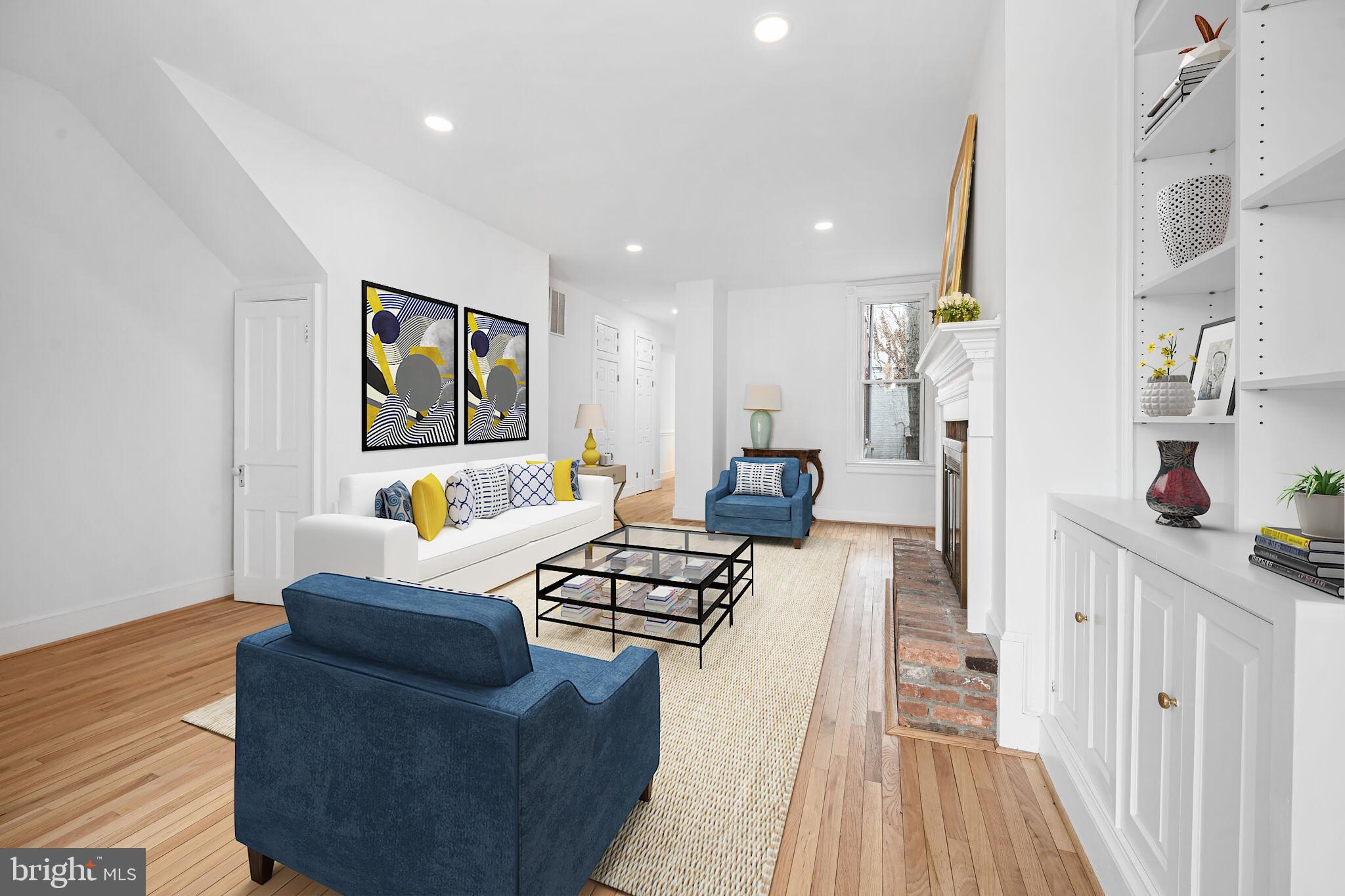 329 Constitution Avenue Northeast Washington, DC 20002 - Photo 11 of 62 a living room with furniture and painting on the wall next to a window