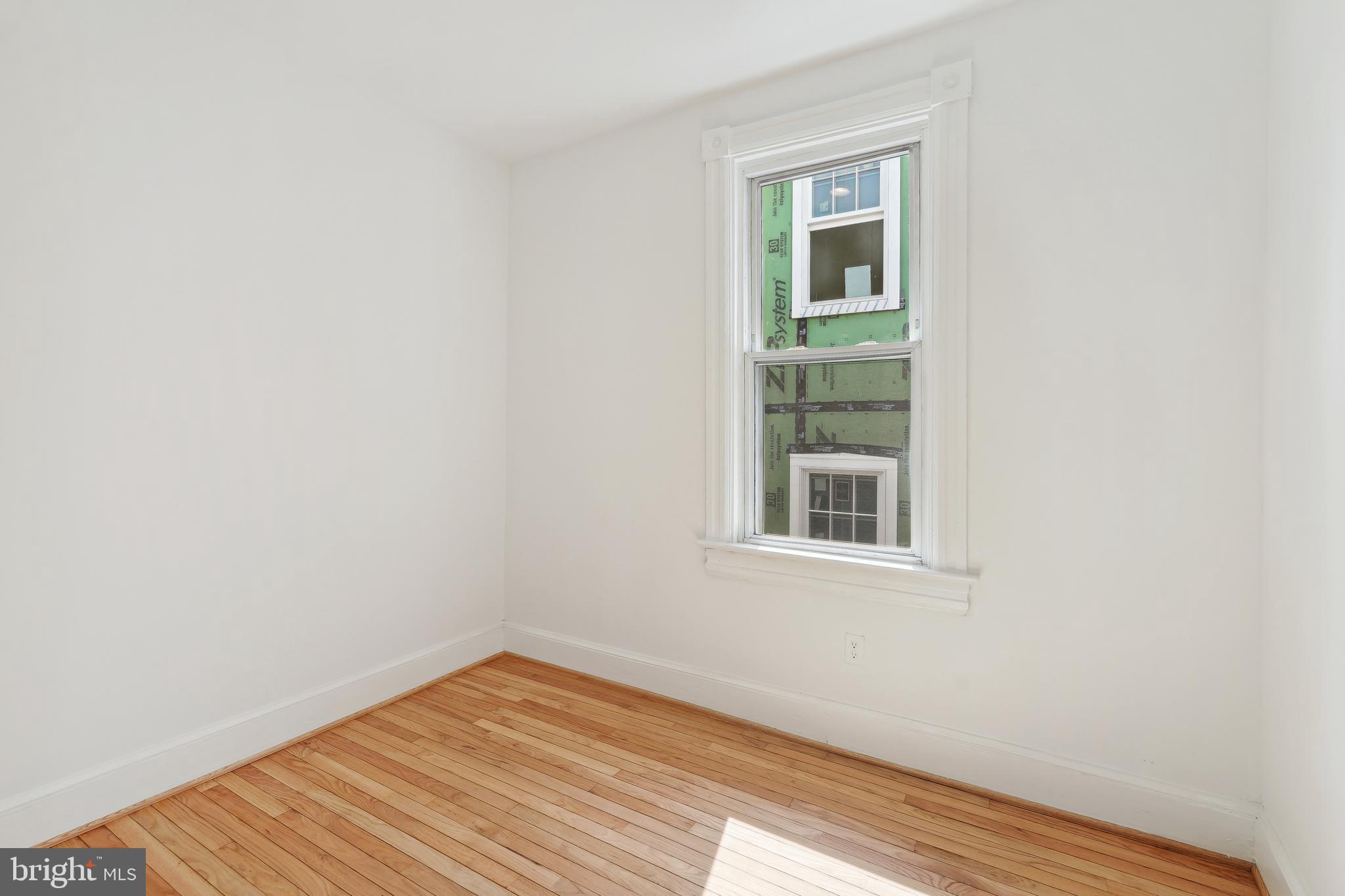 329 Constitution Avenue Northeast Washington, DC 20002 - Photo 32 of 62 an empty room with a window