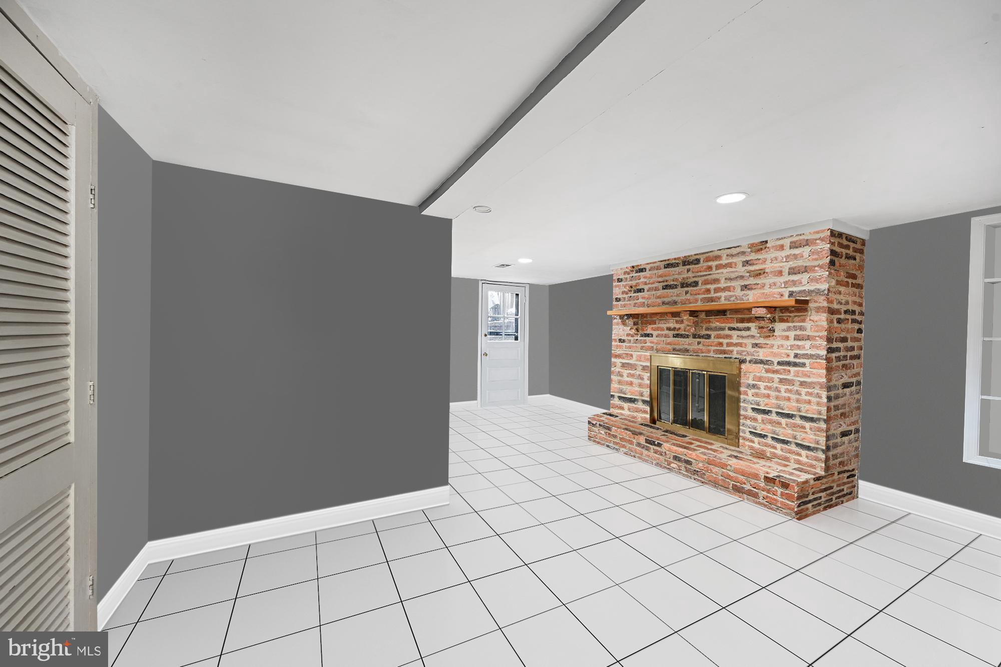 329 Constitution Avenue Northeast Washington, DC 20002 - Photo 48 of 62 a view of an empty room with a fireplace