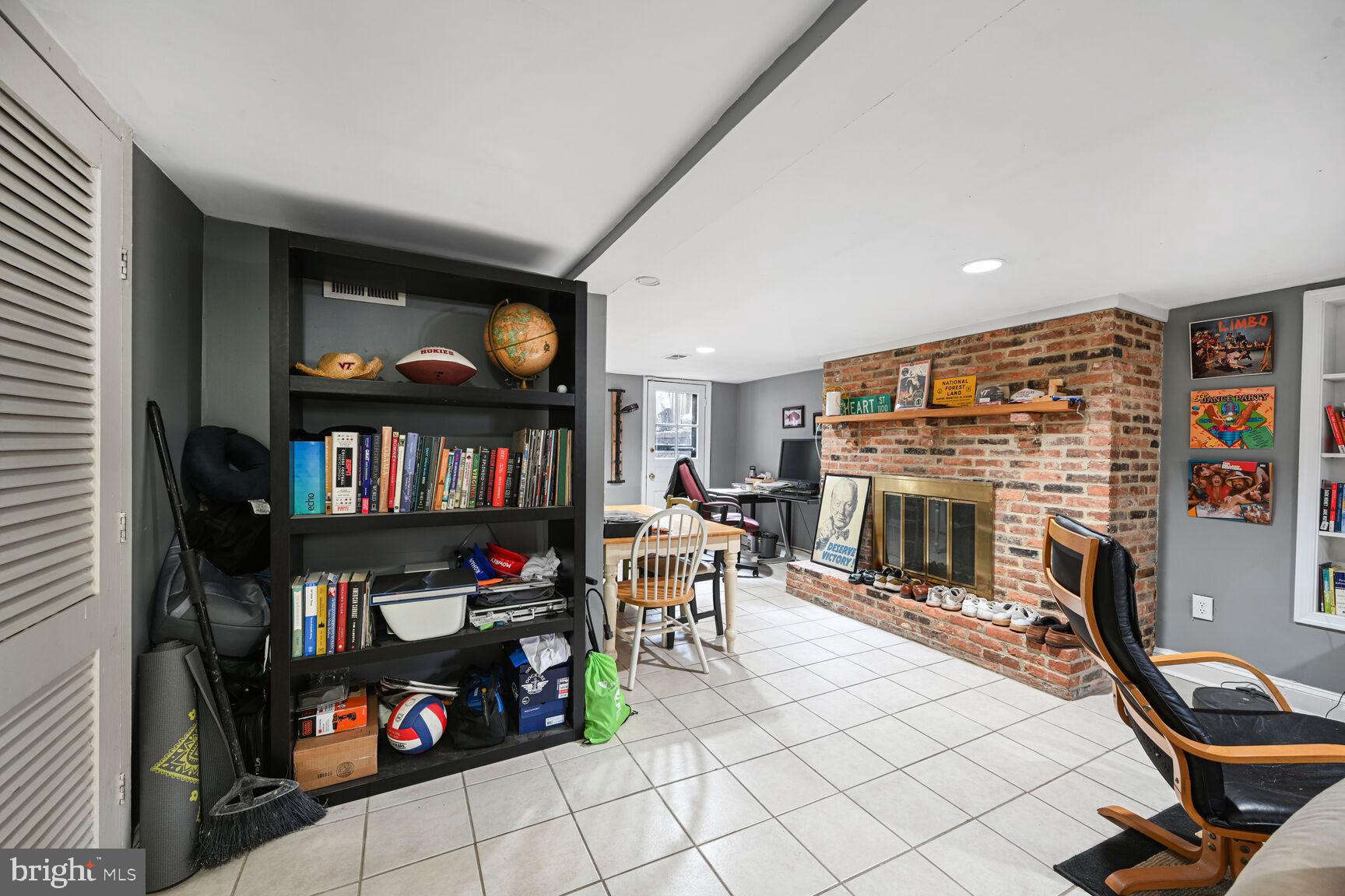 329 Constitution Avenue Northeast Washington, DC 20002 - Photo 49 of 62 a living room with lots of furniture and a flat screen tv