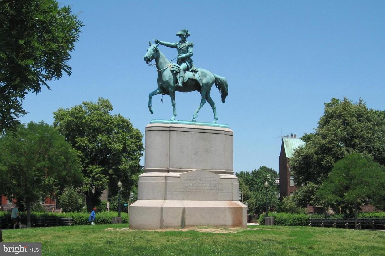 329 Constitution Avenue Northeast Washington, DC 20002 - Photo 58 of 62 a front view of a house with a yard