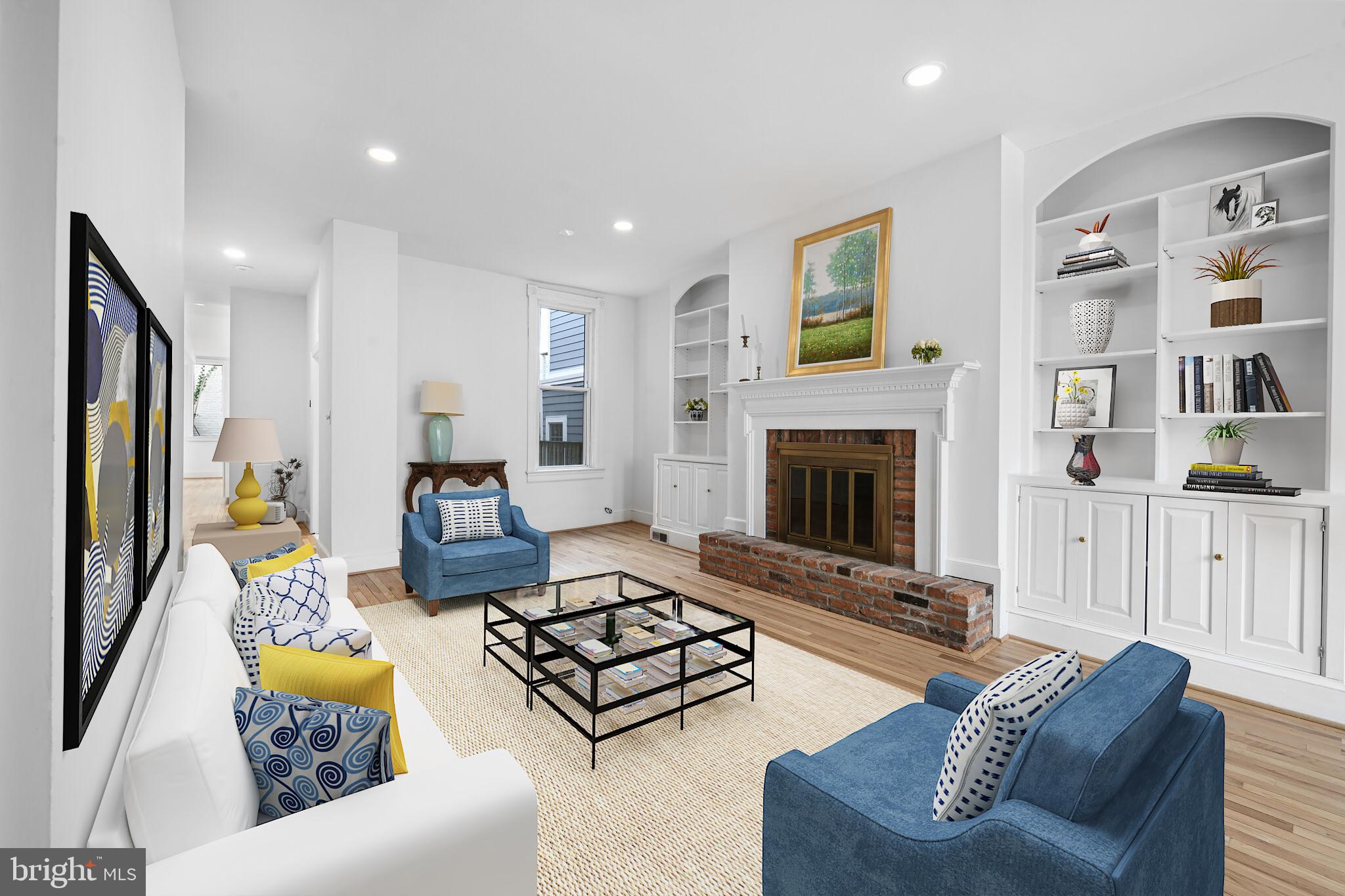 329 Constitution Avenue Northeast Washington, DC 20002 - Photo 7 of 62 a living room with furniture and a fireplace