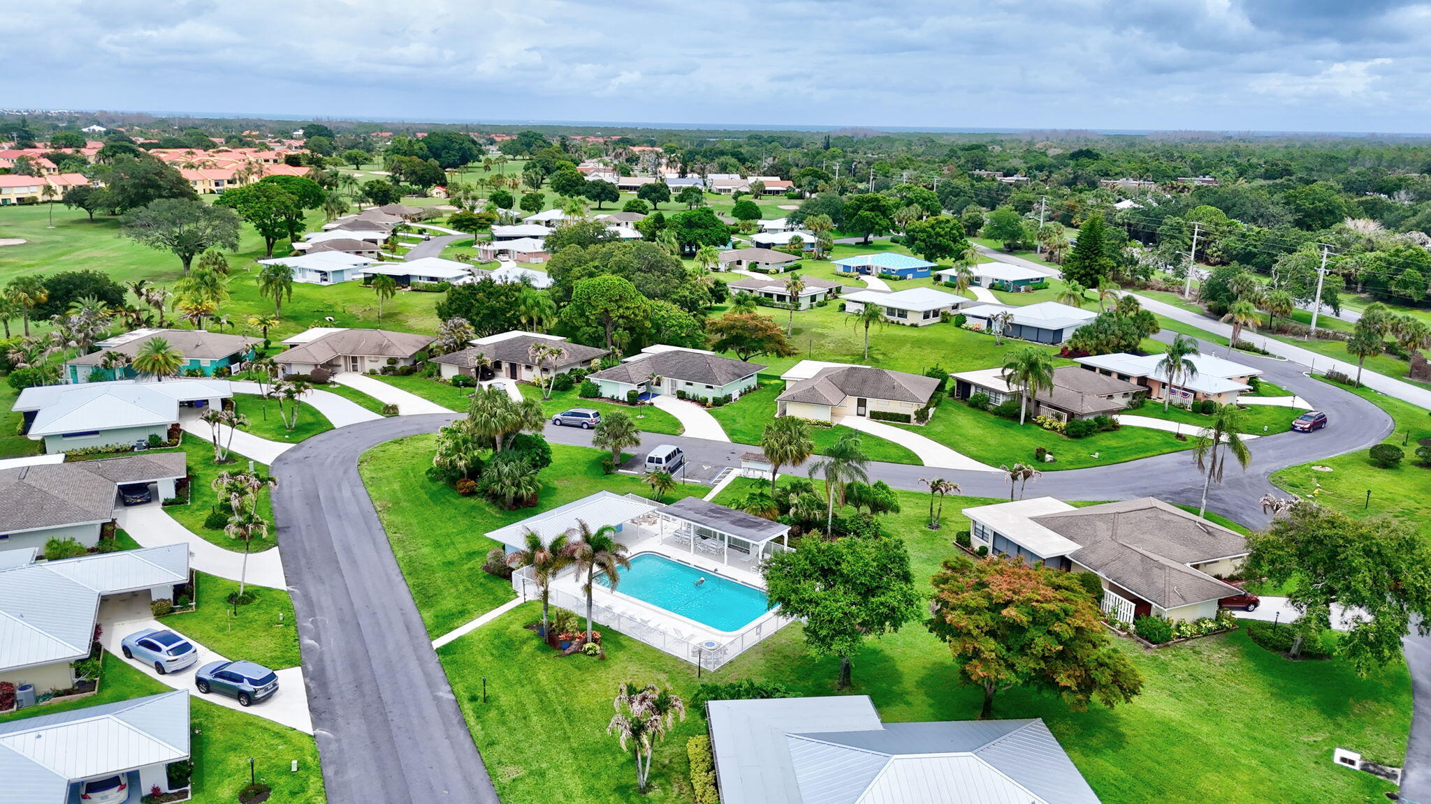 5251 Southeast Sea Island Way Stuart, FL 34997 - Photo 52 of 68 an aerial view of multiple house