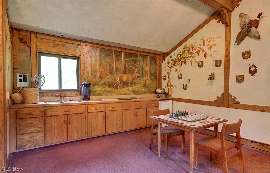 2078 Ridge Road Hinckley, OH 44233 - Photo 32 of 35 Entertaining is a breeze in the lake cottage with a kitchenette and half bath!