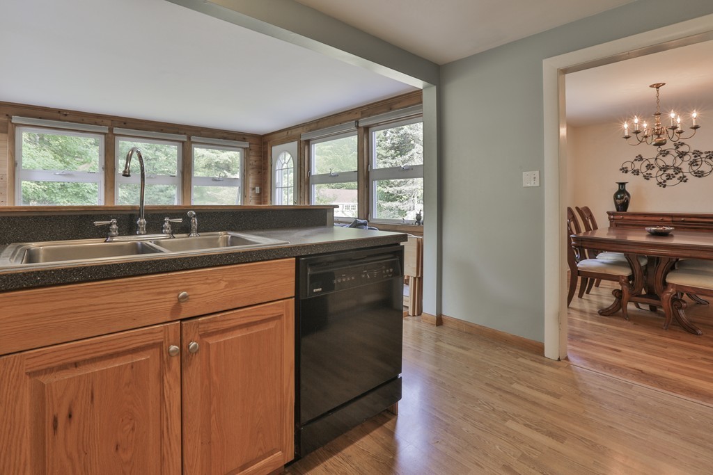 8 Walnut Road Chelmsford, MA 01824 - Photo 11 of 22 a kitchen with a sink and a window