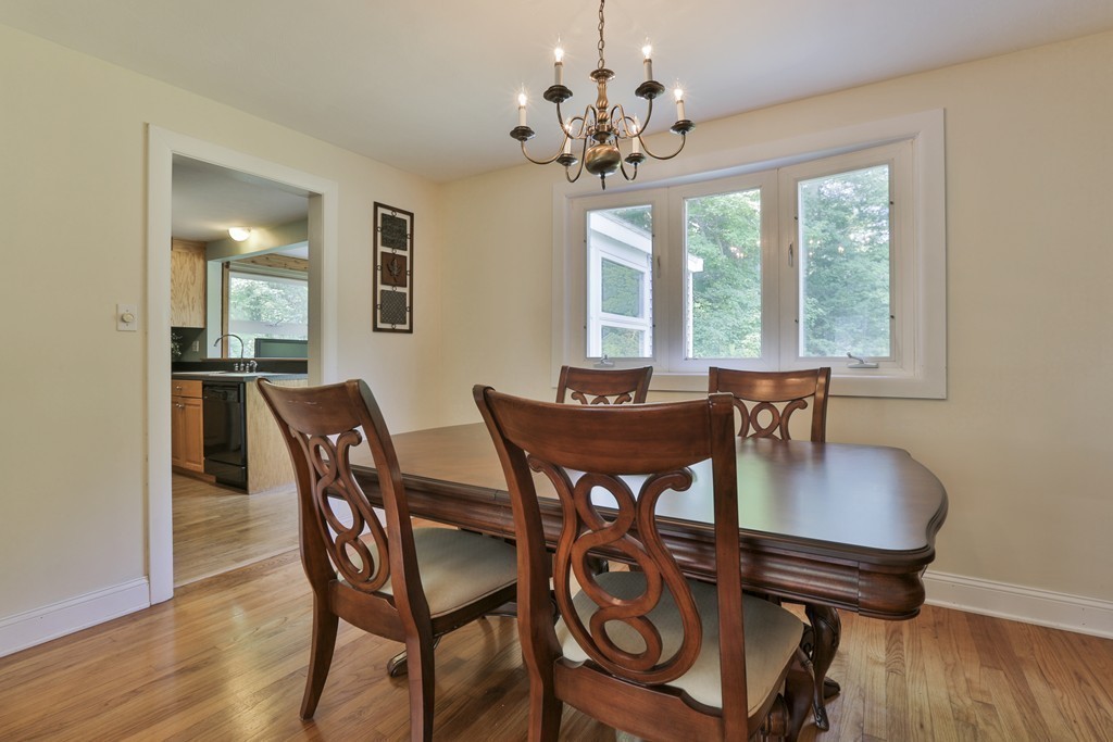 8 Walnut Road Chelmsford, MA 01824 - Photo 12 of 22 a view of a dining room with furniture window and wooden floor