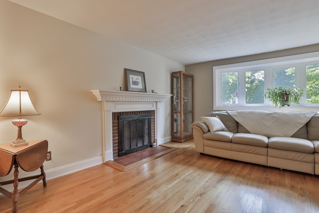 8 Walnut Road Chelmsford, MA 01824 - Photo 14 of 22 a living room with furniture and a fireplace