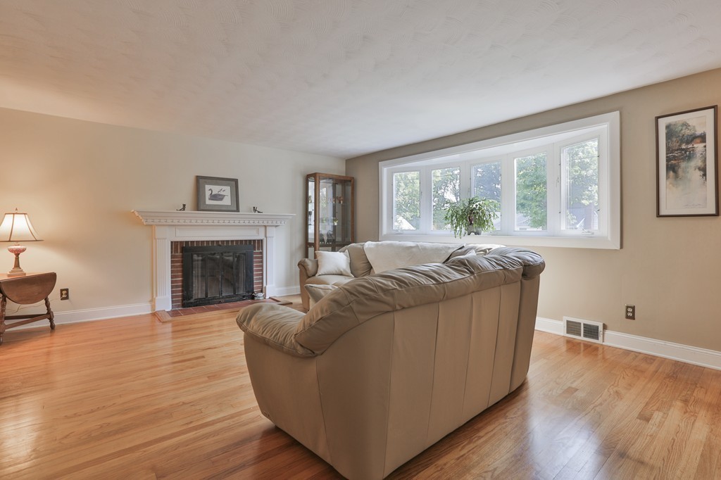 8 Walnut Road Chelmsford, MA 01824 - Photo 15 of 22 a living room with furniture and a fireplace