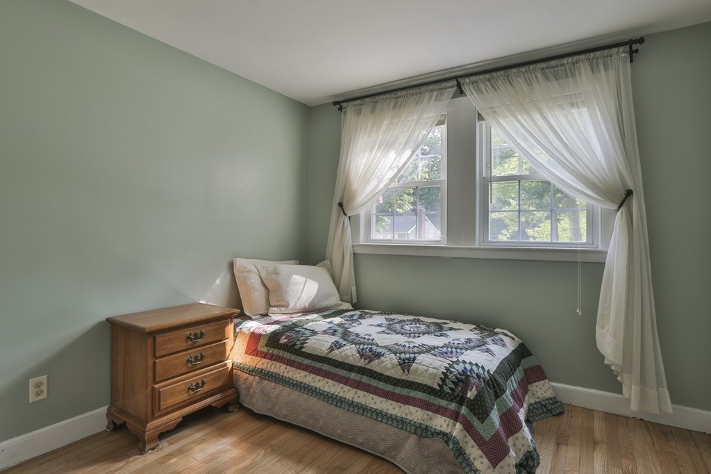 8 Walnut Road Chelmsford, MA 01824 - Photo 19 of 22 a bedroom with a bed and a window