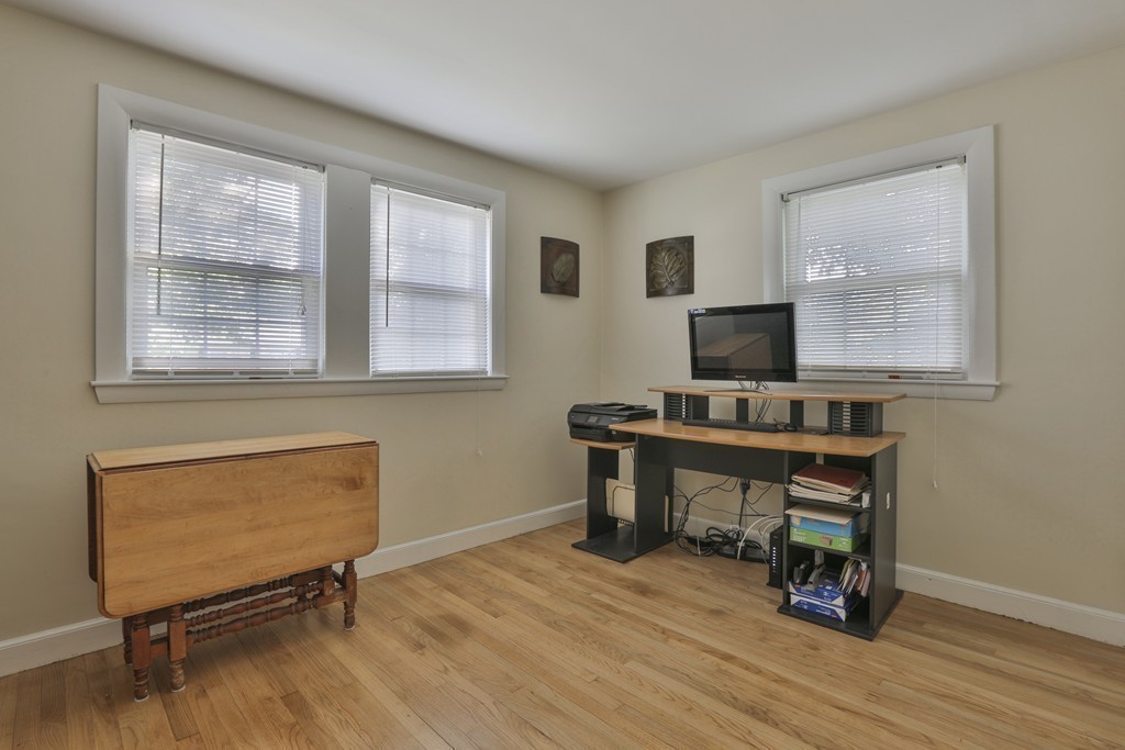8 Walnut Road Chelmsford, MA 01824 - Photo 20 of 22 a view of a workspace with furniture and a window