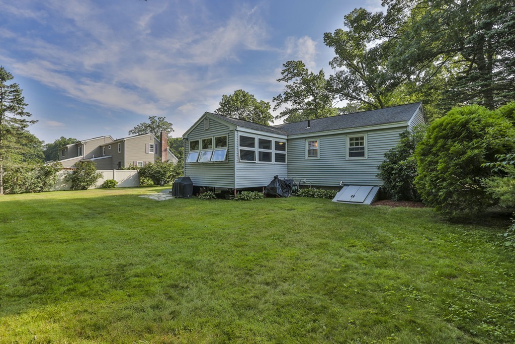 8 Walnut Road Chelmsford, MA 01824 - Photo 3 of 22 a front view of house with yard and green space