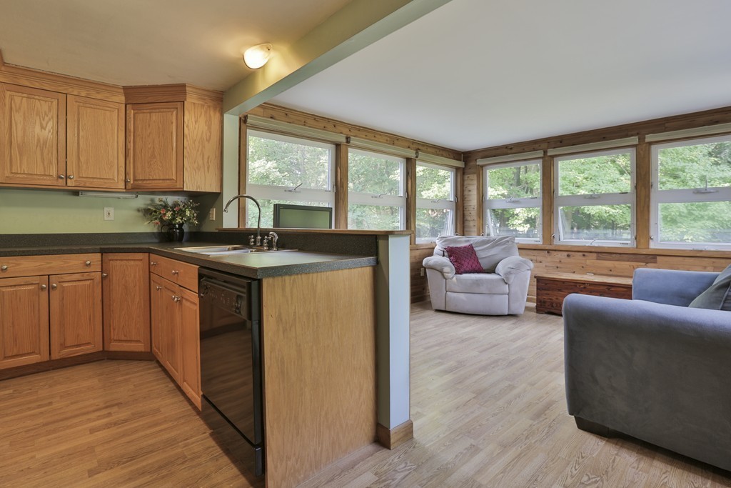8 Walnut Road Chelmsford, MA 01824 - Photo 6 of 22 a kitchen with stainless steel appliances granite countertop a stove a sink and a refrigerator